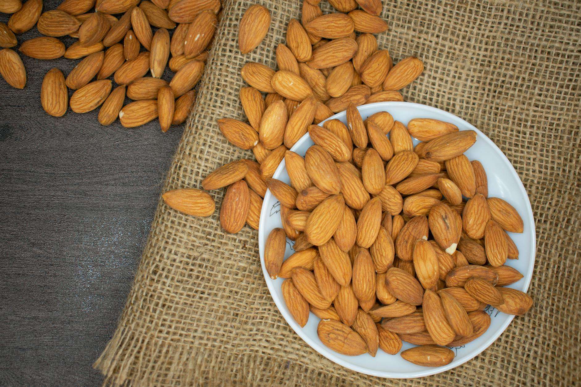 https://www.pexels.com/photo/brown-almond-nuts-on-white-plate-3997459/