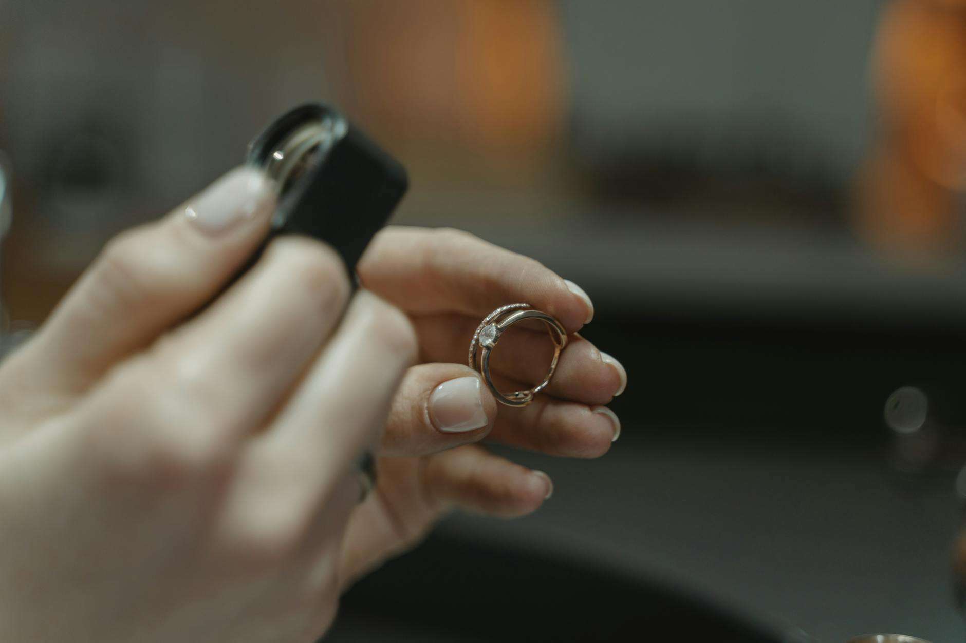 https://www.pexels.com/photo/a-person-holding-a-diamond-ring-6263113/