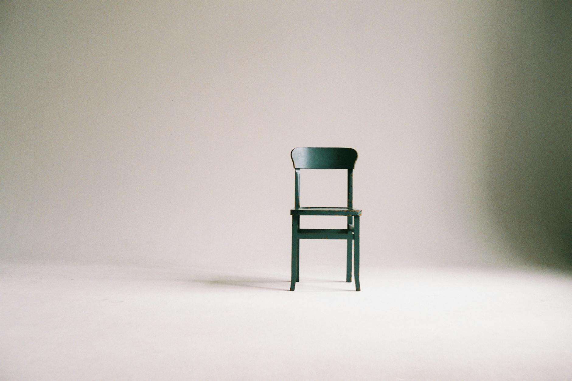 https://www.pexels.com/photo/wooden-chair-on-a-white-wall-studio-963486/