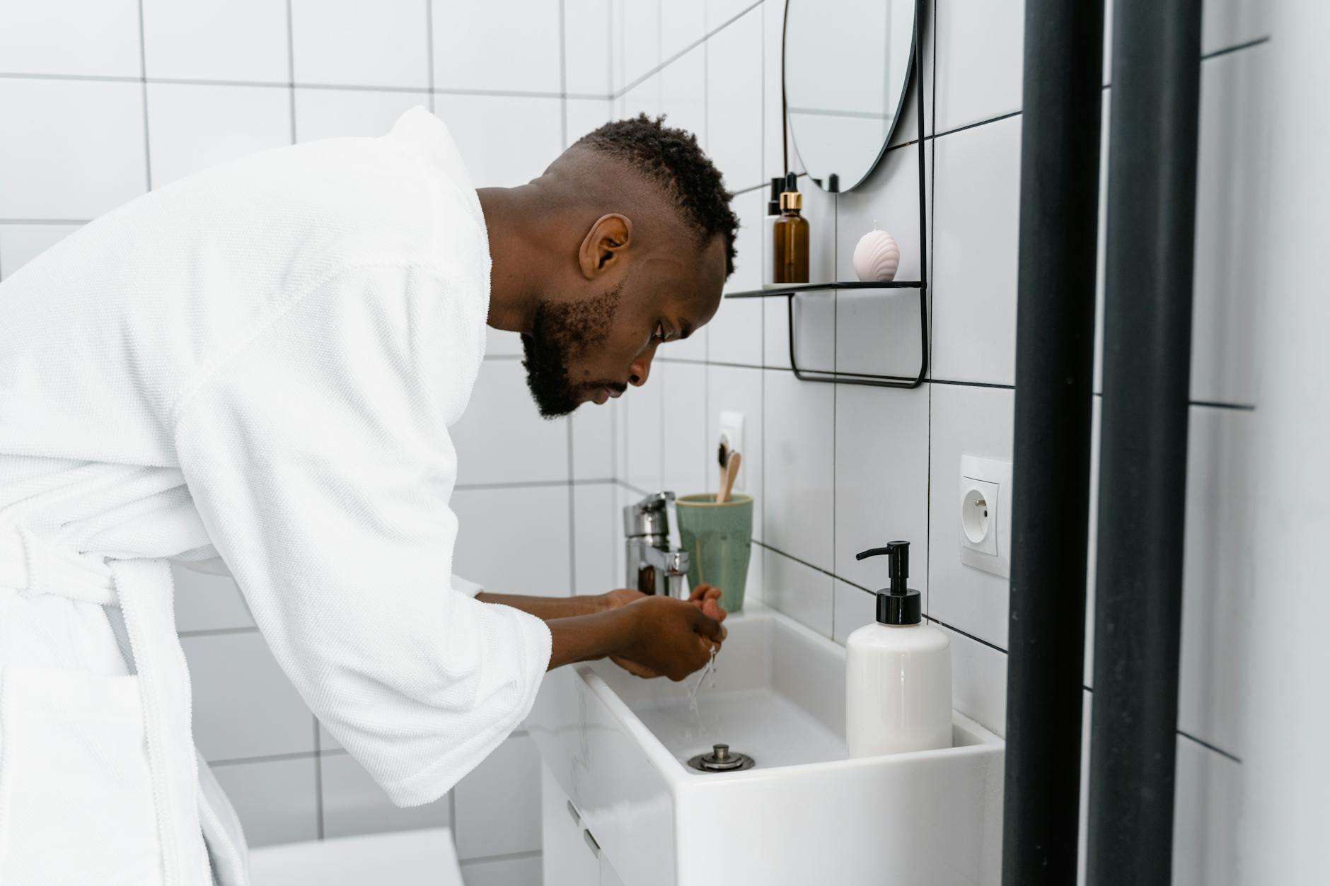 a man inside a bathroom