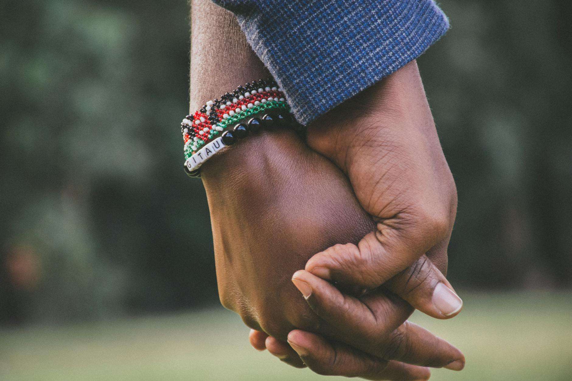 two person holding hands