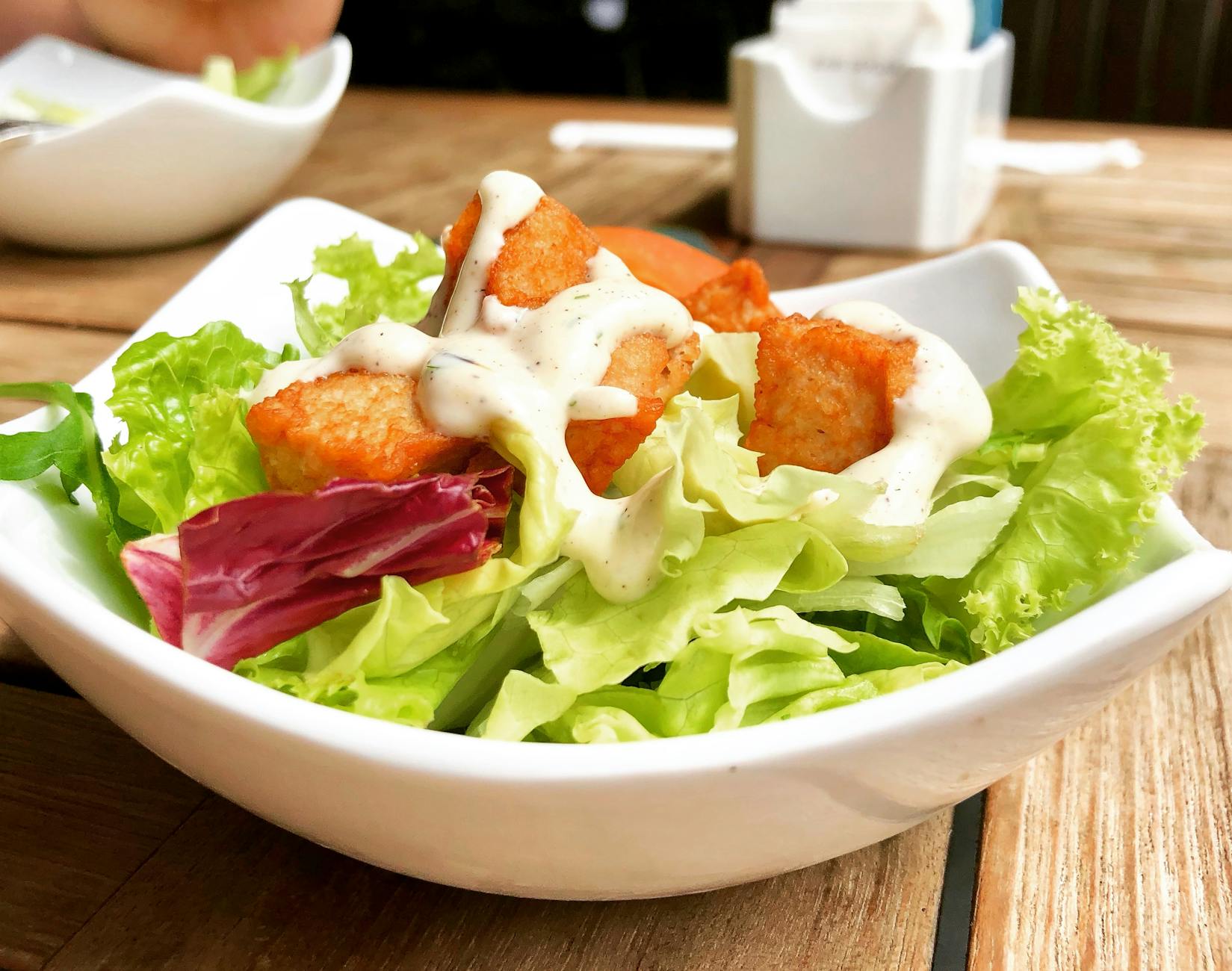 Salad on a plate in table